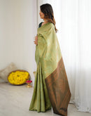 Pista Green Silk Woven Saree