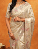 Beige Silk Woven Embroidery Stone Work Embellished Saree