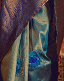 Teal Green Silk Woven Kanjivaram Saree