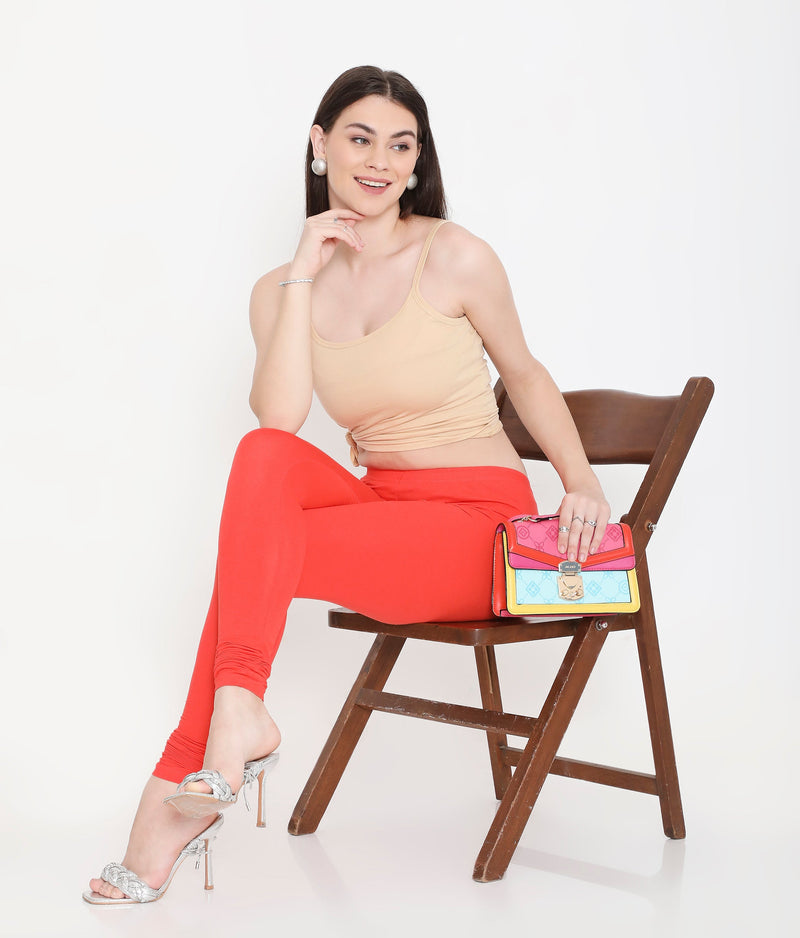 WOMEN SOLID ORANGE COTTON CHURIDAR LEGGINGS
